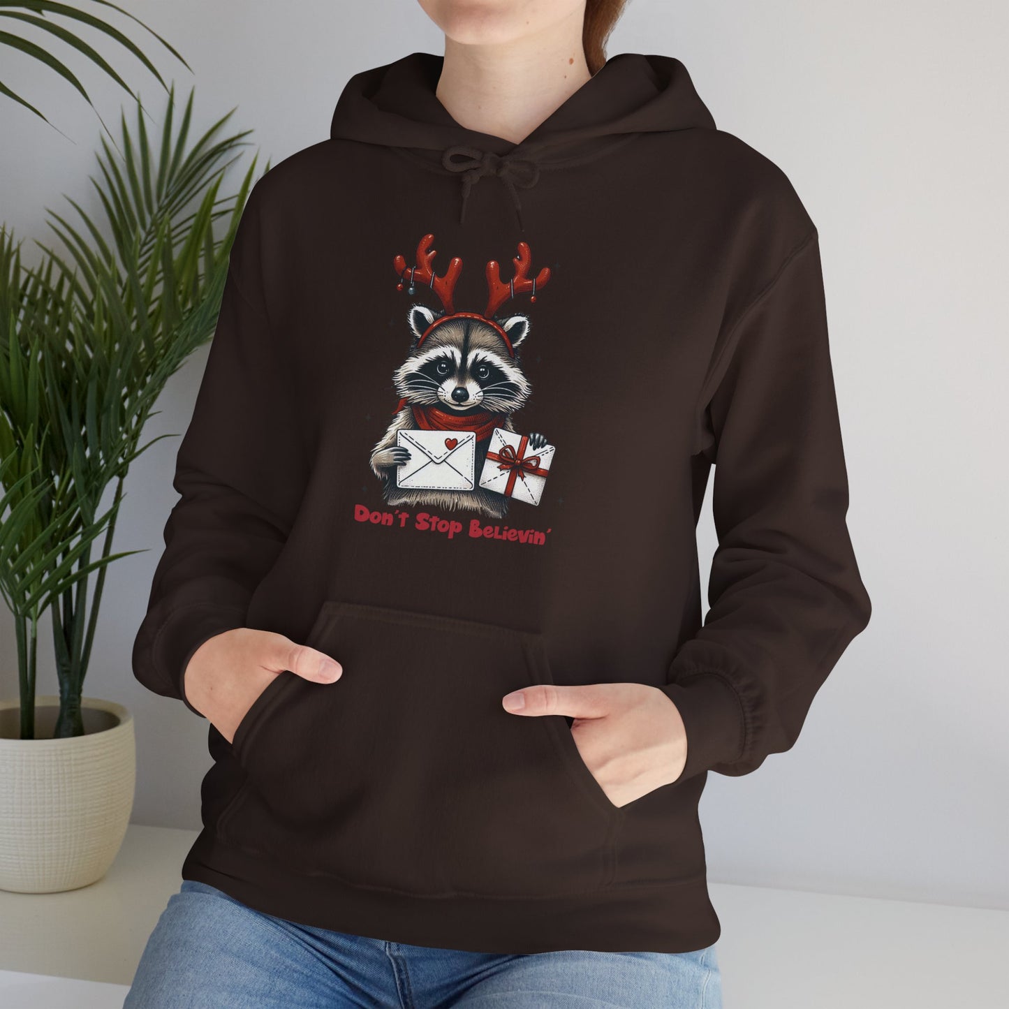 Christmas Raccoon Hoodie — 'Don't Stop Believin'' Festive Holiday Sweatshirt