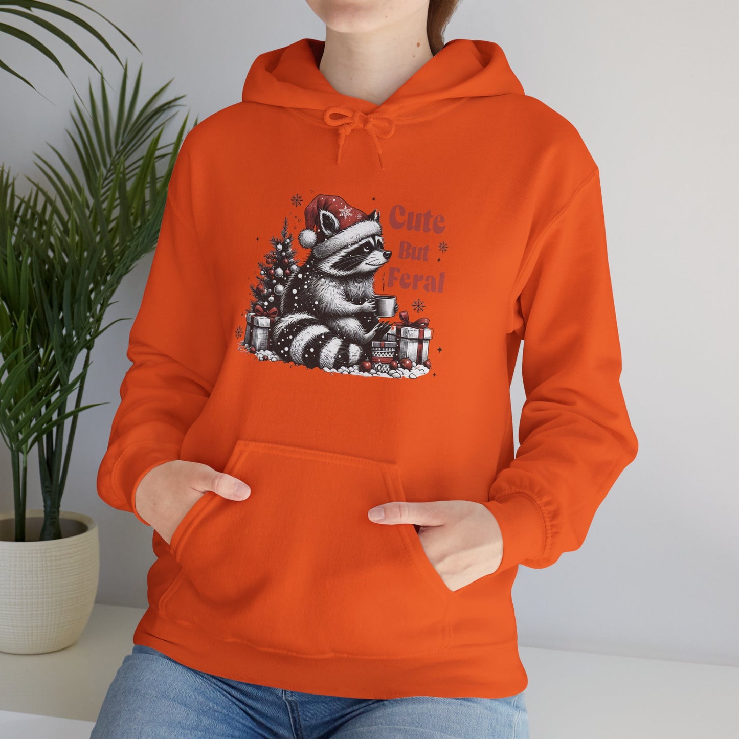 Cute But Feral Raccoon Holiday Hoodie — Christmas Animal Graphic Sweatshirt