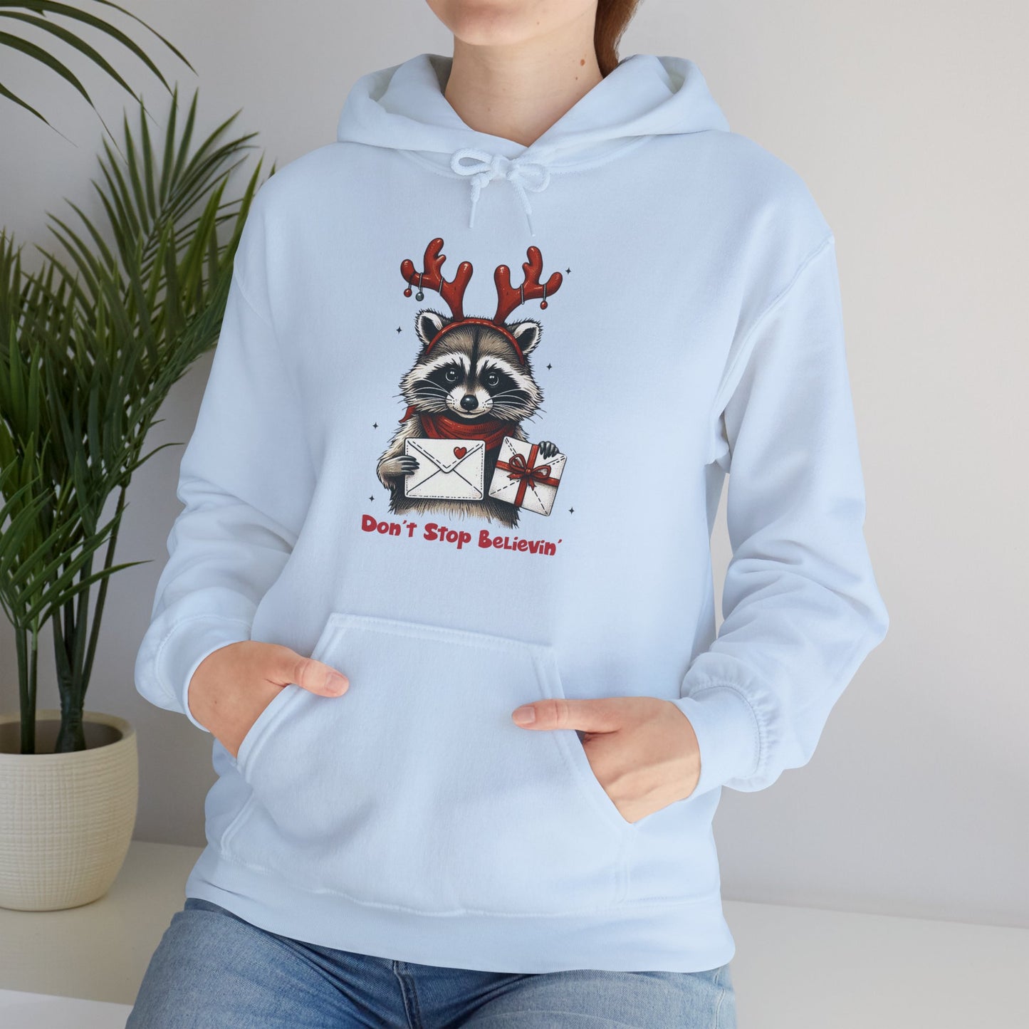 Christmas Raccoon Hoodie — 'Don't Stop Believin'' Festive Holiday Sweatshirt