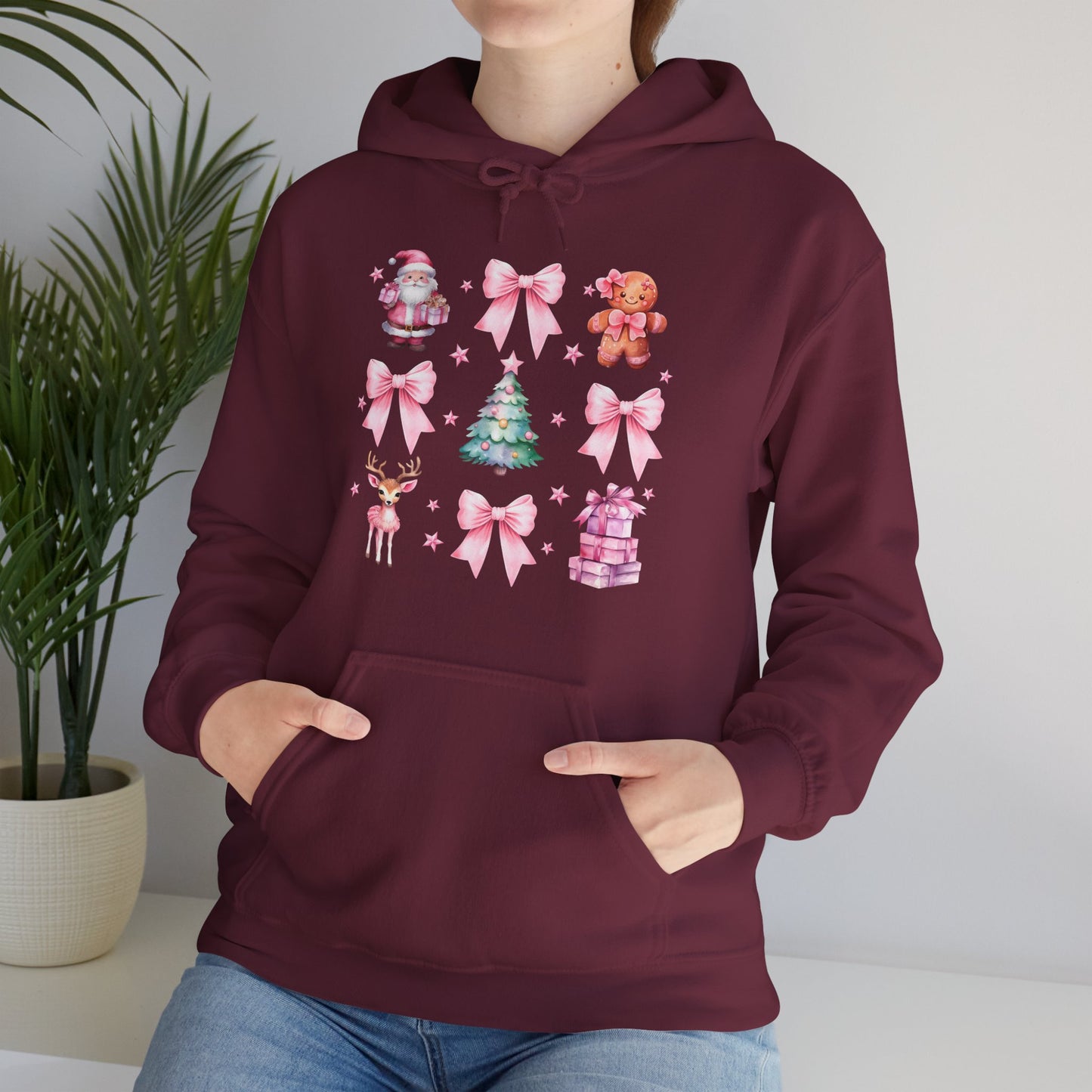 Christmas Graphic Hoodie — Pink Holiday Icons (Santa, Tree, Gingerbread, Bows)
