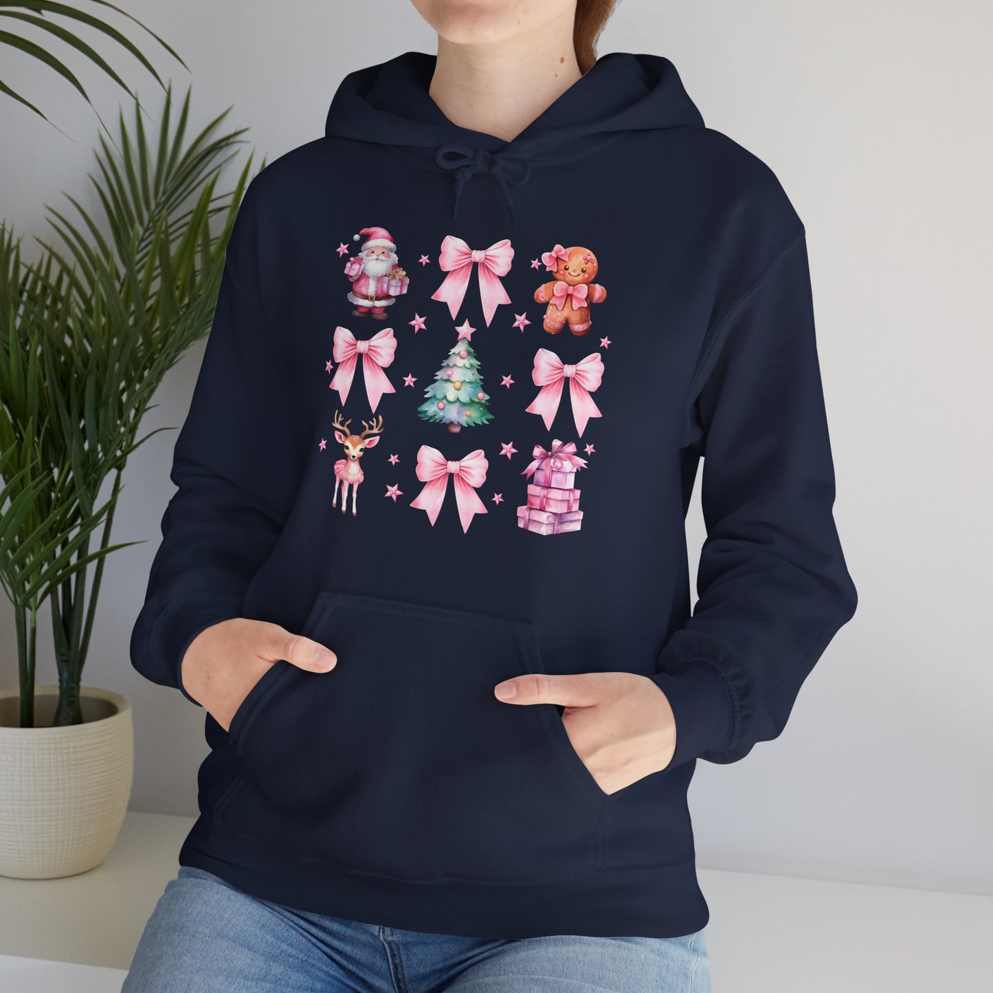 Christmas Graphic Hoodie — Pink Holiday Icons (Santa, Tree, Gingerbread, Bows)