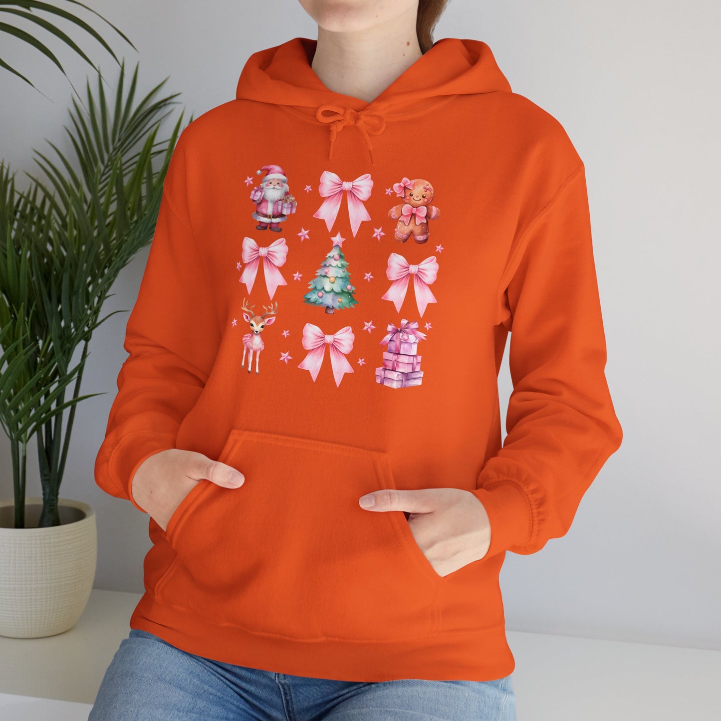 Christmas Graphic Hoodie — Pink Holiday Icons (Santa, Tree, Gingerbread, Bows)